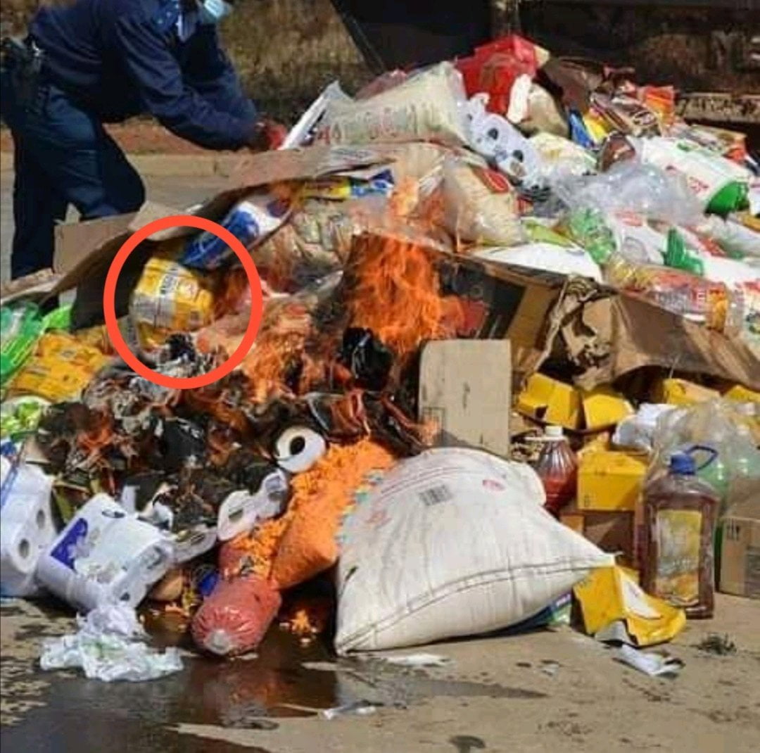 As police were burning looted food, people noticed something